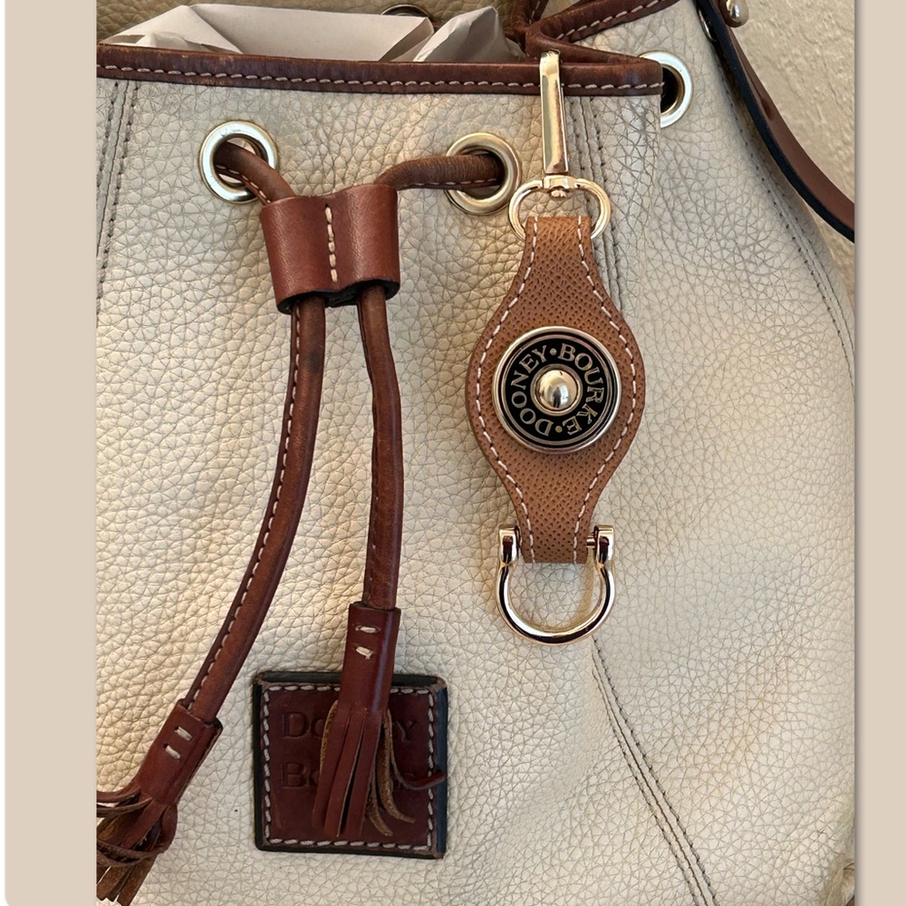 Authentic Dooney & Bourke leather & plate charm with unbranded keychain hardware